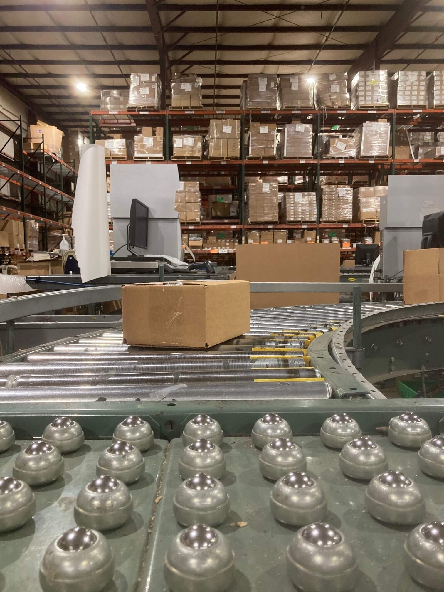 warehouse featuring conveyor with box