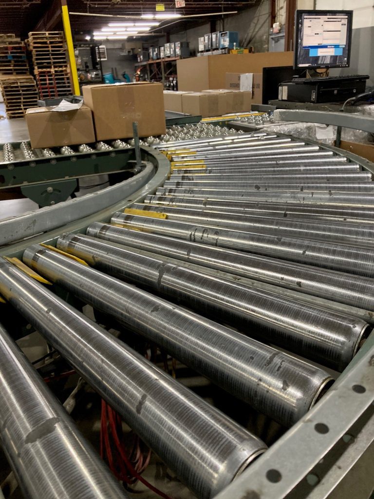package moving down a conveyor